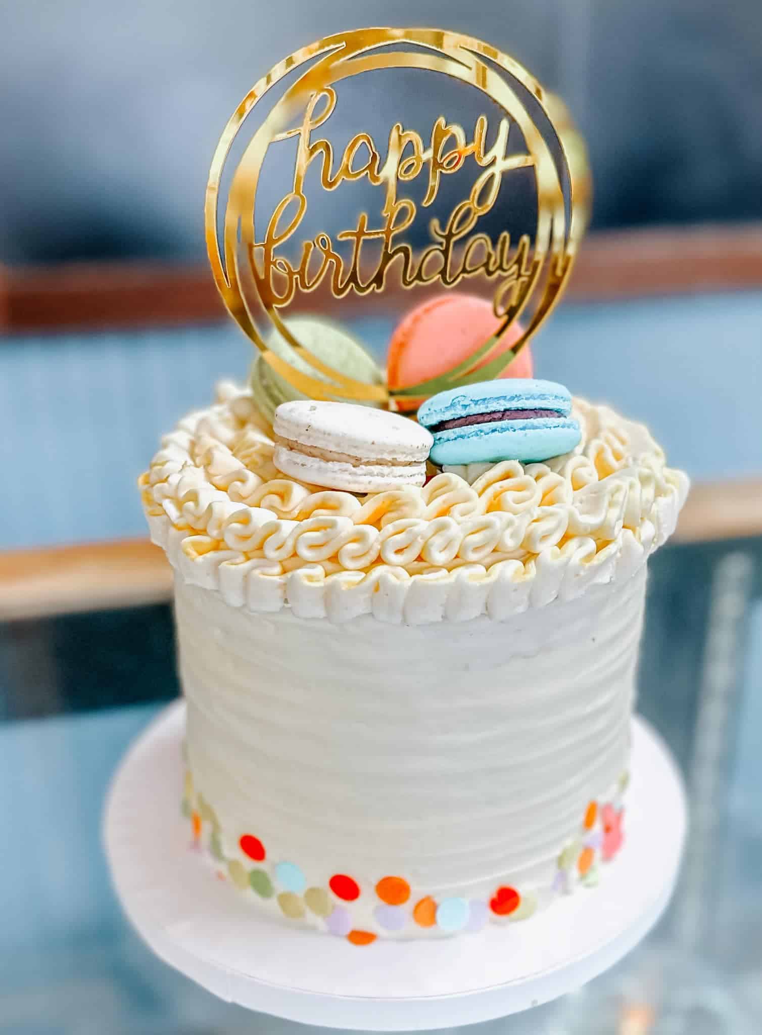A birthday cake with macarons.