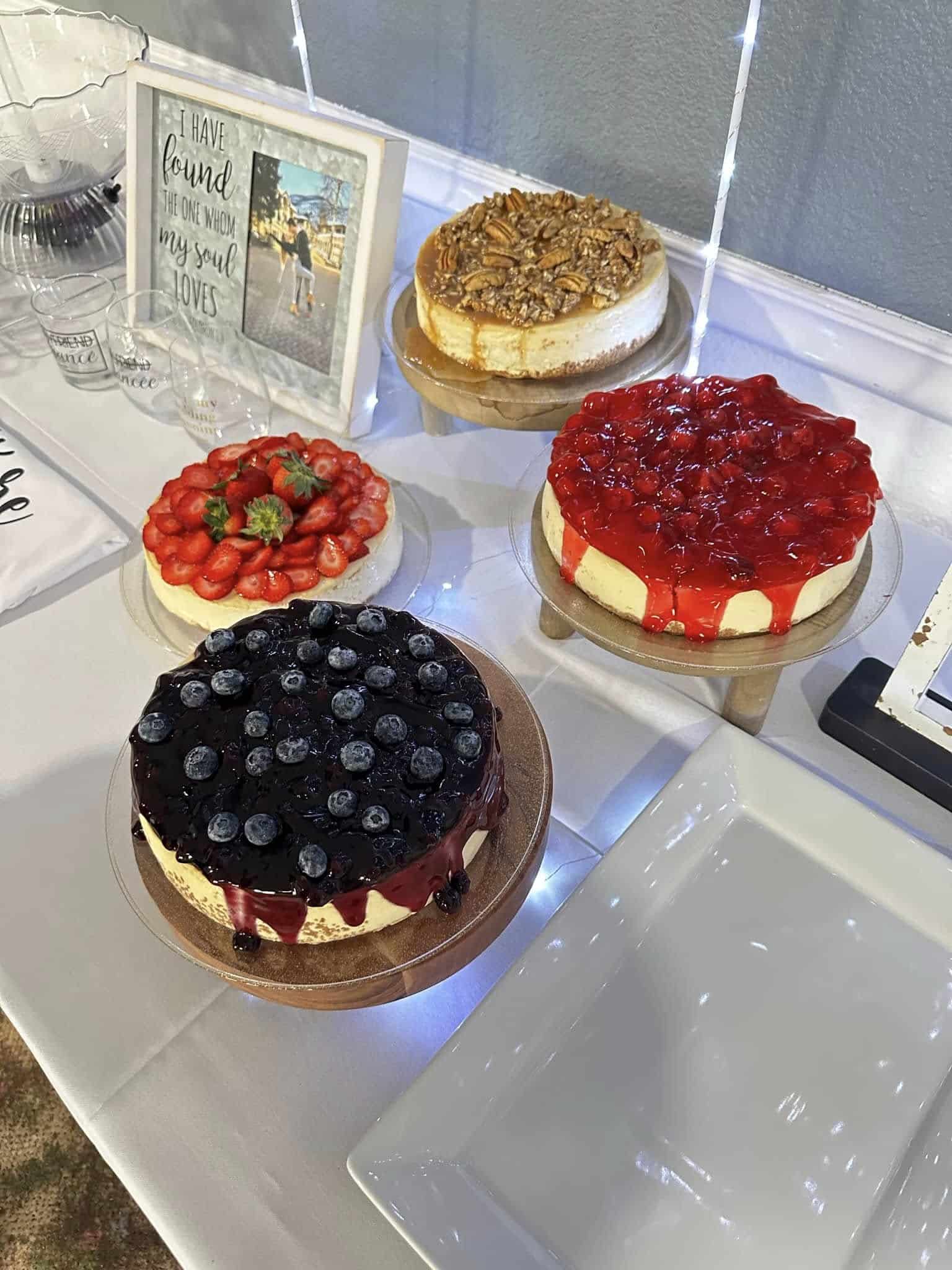 Assorted cheesecakes on a table.