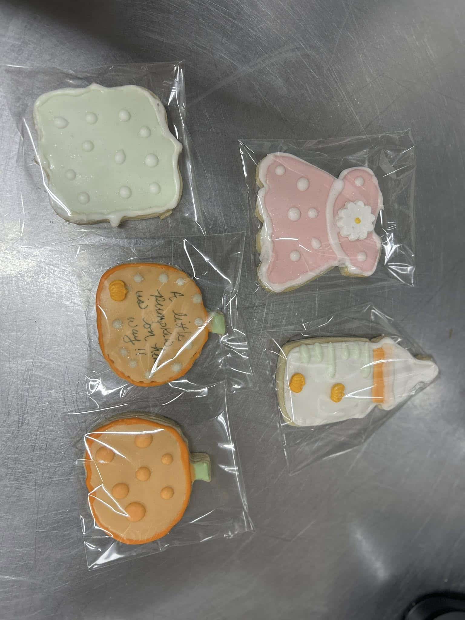 Assorted baby shower sugar cookies.